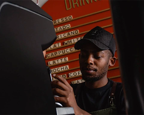 Barista making coffee at Spoon Bakery and Eatery